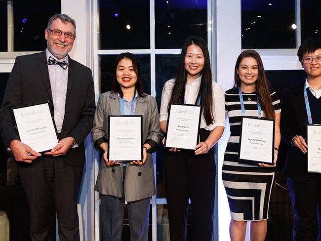 Four Adelaide students, including Krystal Kennedy (second from right) and their mentor (far left) have won a top prize at Australia's leading chemical engineering awards event. Picture: Krystal Kennedy/Supplied