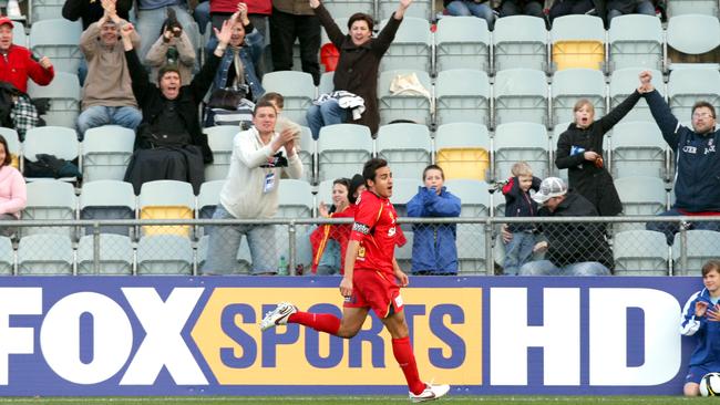 Former Adelaide United captain Travis Dodd celebrates his winner against Perth Glory in the 2008/09 A-League season-opener at Hindmarsh Stadium.