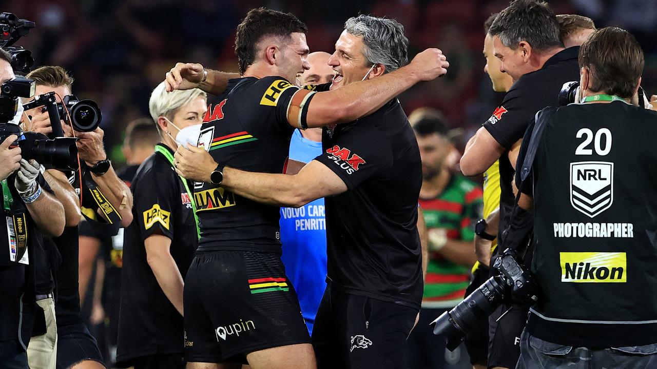 Nathan and Ivan Cleary come together after winning the 2021 NRL grand final. Picture: Adam Head