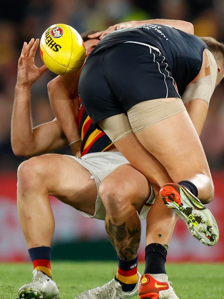 Patrick Cripps lays a big tackle on Lachlan Murphy. Picture: Michael Willson/AFL Photos via Getty Images