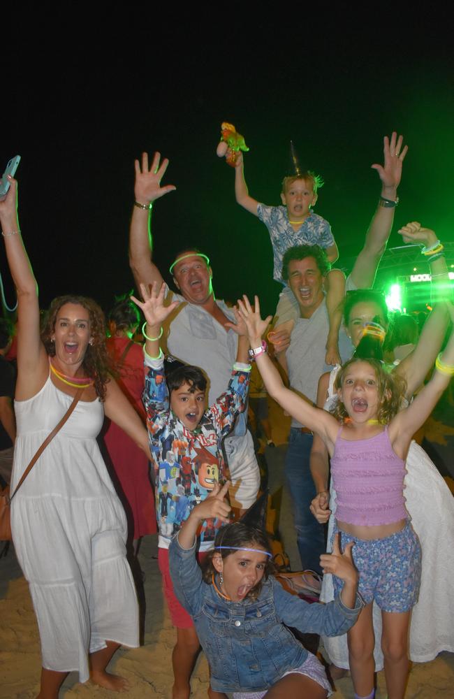 Danya, Alex, Caroline, Sam and kids (no surnames given) celebrating New Year's Eve 2022 at Mooloolaba. Photo: Elizabeth Neil