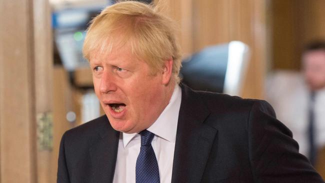 Britain's Prime Minister Boris Johnson attends an event where he took questions from young people aged 9-14 inside 10 Downing Street in London on August 30, 2019 ahead of an education announcement. - British Prime Minister Boris Johnson on August 30 warned any attempt by MPs next week to stop Brexit or delay it beyond October 31 would do "lasting damage" to public trust in politics. (Photo by JEREMY SELWYN / POOL / AFP)