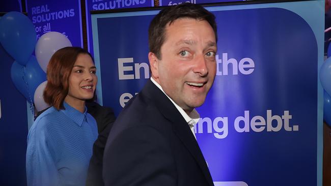 Victorian Liberal leader Matthew Guy, with his wife Renae, arrives at the Doncaster Bowling Club to deliver his concession speech. Picture: David Caird