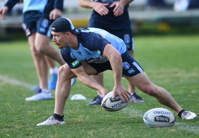 Damien Cook is one of a host of SuperCoach guns on Origin duty.