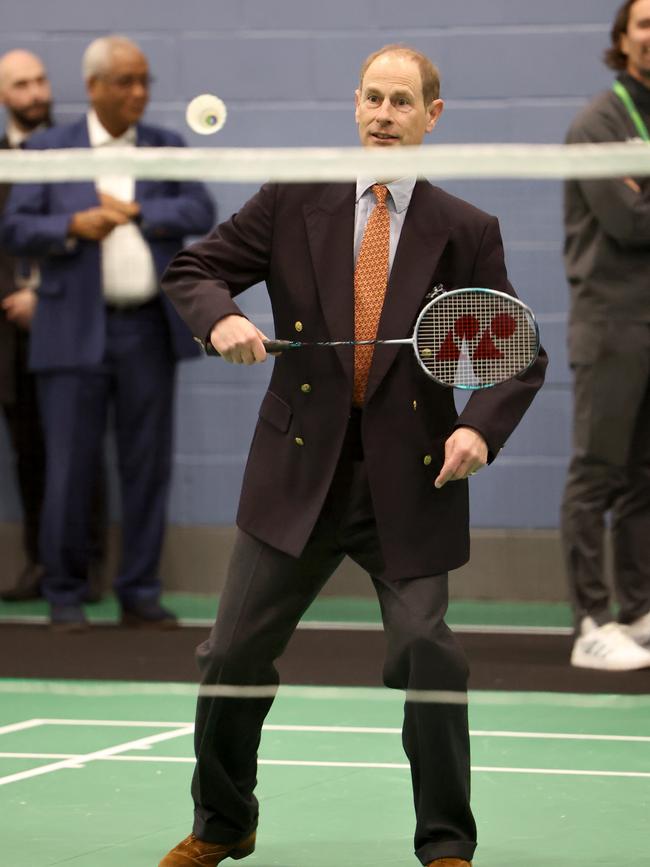 Prince Edward, Duke of Edinburgh hits the shuttlecock as he takes part in a badminton match in March. Picture: Getty Images