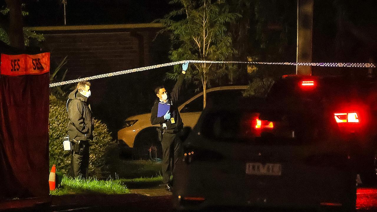 Police at the scene in Huntingdon Ave on Saturday night. Picture: Ian Currie