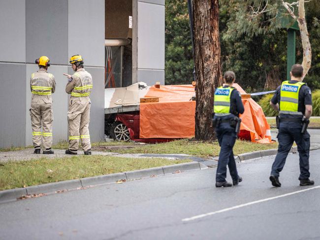 Police and emergency services at the scene the morning after the crash. Picture: Jake Nowakowski