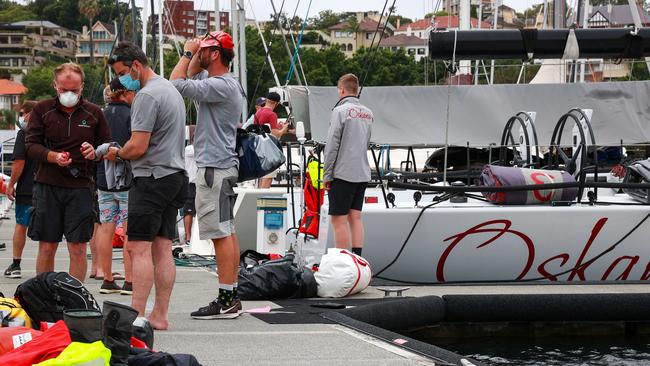 The crew of Oskana back at the Cruising Yacht Club of Australia.