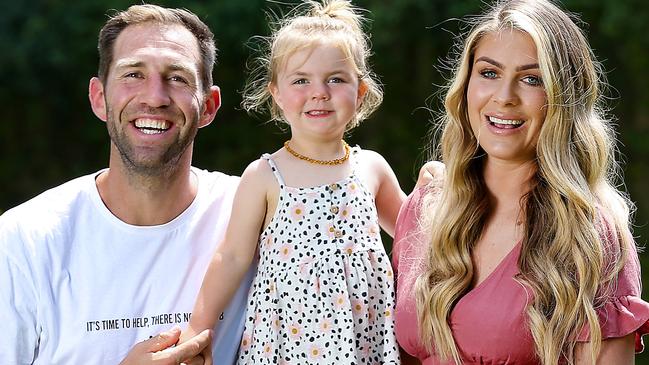 Former AFL footballer Travis Cloke with his wife Rebeccah and daughter Scarlett, 2. Picture: Ian Currie