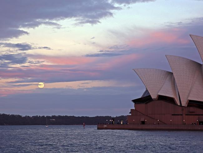 Supermoon over Sydney, where cloud blocked some of the show. Picture: Nicholas Eagar