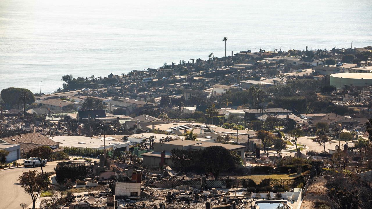 Burned houses from the Palisades Fire are seen on January 10, 2025 in the Pacific Palisades neighbourhood of Los Angeles. (Photo by Apu Gomes / GETTY IMAGES NORTH AMERICA / Getty Images via AFP)