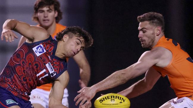 Stephen Coniglio battles for the ball against Melbourne’s George Grey during a BFL clash last week. Picture: Martin Keep/AFL Photos