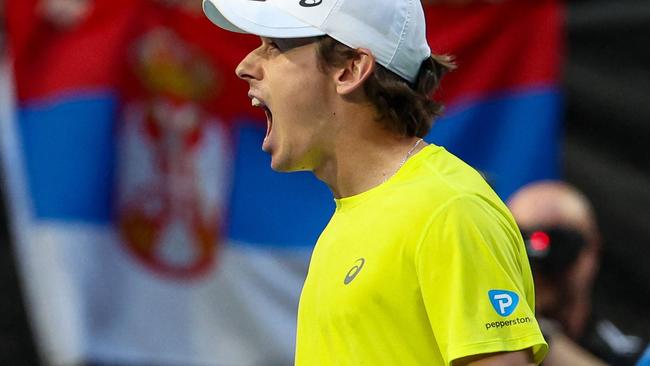 Australia's Alex de Minaur celebrates winning his men's singles match against Serbia's Novak Djokovic at the United Cup tennis tournament in Perth on January 3, 2024. (Photo by COLIN MURTY / AFP) / -- IMAGE RESTRICTED TO EDITORIAL USE - STRICTLY NO COMMERCIAL USE --