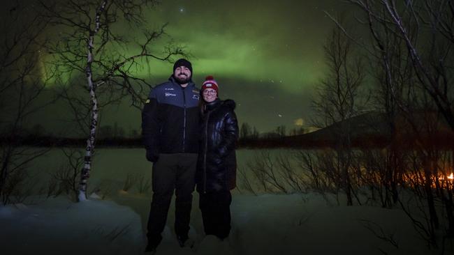 Elyse Popplewell and her partner viewing the Northern Lights. Picture: Wandering Owl