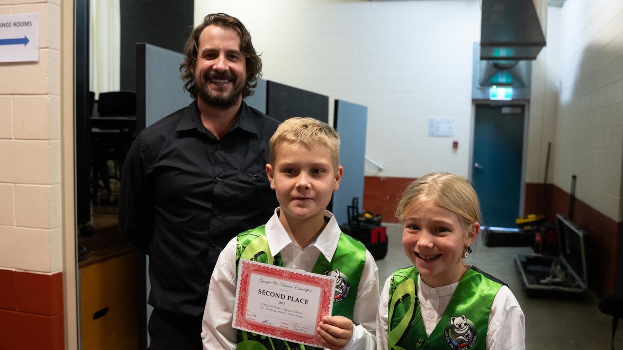 Zeke and Oliva Cocks with their Jones Hill conductor at the Gympie Eisteddfod. Jones Hill Primary Concert placed second in the Eisteddfod. July 31, 2023. Picture: Christine Schindler