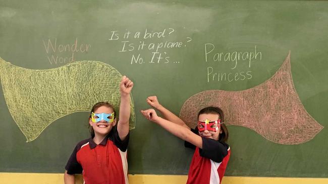 Mt Sylvia State School students Matikah "Wonder Word" Reid and Isabella "Princess Paragraph" Hanford prepare for national book week. Picture: Mt Sylvia State School