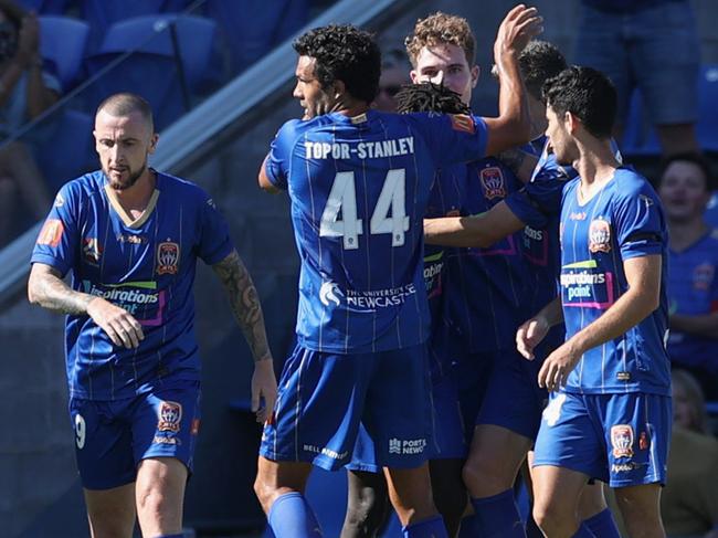 NEWCASTLE, AUSTRALIA - FEBRUARY 07: Newcastle Jets celebrate a goal from Valentino Yuel kicks at goal saved by Jack Duncan of the Jets during the A-League match between the Newcastle Jets and Melbourne City at McDonald Jones Stadium, on February 07, 2021, in Newcastle, Australia. (Photo by Ashley Feder/Getty Images)