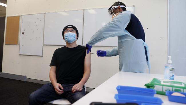 A Commonwealth employee gets their Covid shot. Picture: Nikki Short