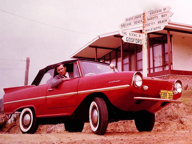 Rod Radford in his Amphicar amphibious car in the 1960s. He used to commute across the entrance to Brisbane Water from his home in Wagstaffe to his business in Ettalong using the car as a boat.