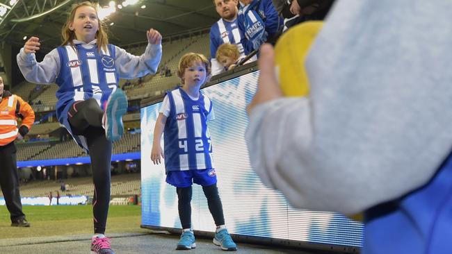 Lacie Harvey has a kick with brother Hudson before the game. Picture: Jay Town