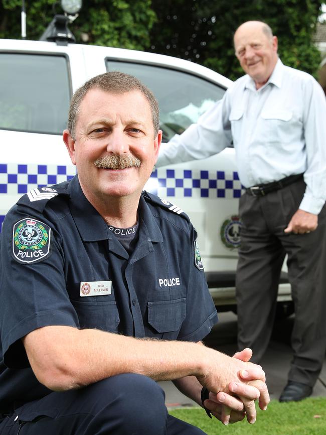 SAPOL officer Senior Sergeant Brian Mattner has received an OAM. Pictured with his father Charles Mattner of Woodside, who received an OAM in 1997. Picture: Stephen Laffer