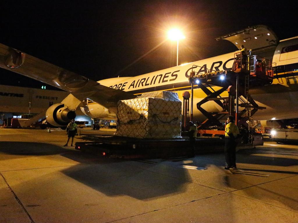 The latest shipment of 500,000 Pfizer COVID-19 vaccines arrives into Sydney International Airport from Singapore. Picture: NCA NewsWire/Gaye Gerard – POOL via NCA NewsWire