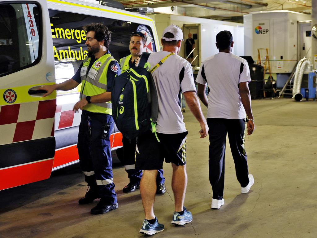 Jasprit Bumrah (R) received an ambulance escort out of the SCG. Picture: Sam Ruttyn