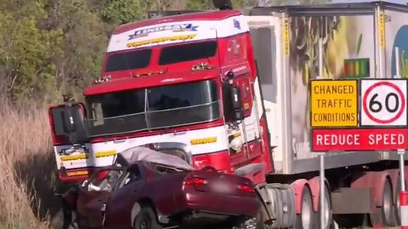 A man has died following a crash involving a B-double truck and a sedan on the Bruce Highway north of Townsville. Picture: 9 News Queensland