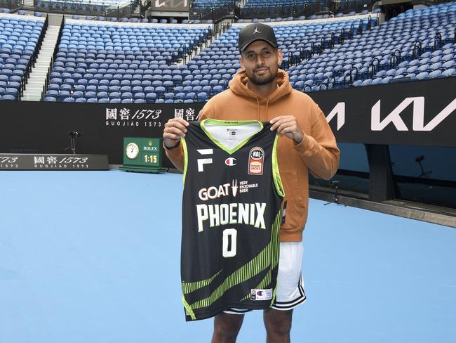 Nick Kyrgios with his South East Melbourne Phoenix basketball singlet after being named as a major contributor. Picture: Andrew Henshaw