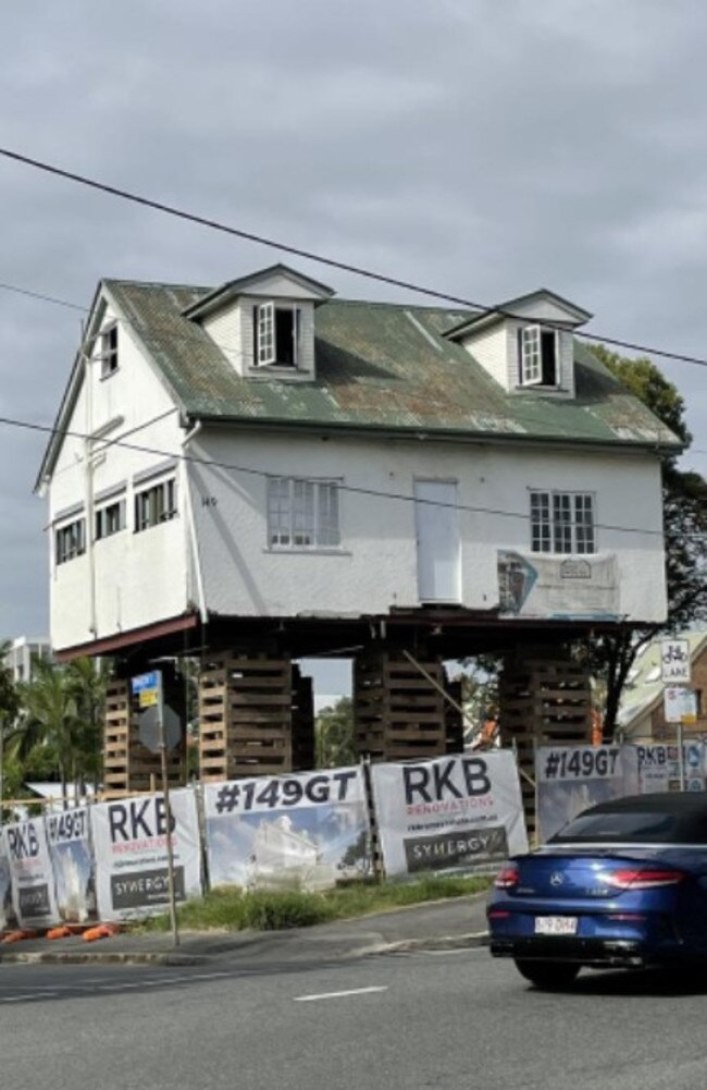 1875-era Claire cottage is being raised and extended.