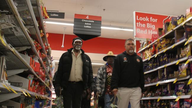 Robin Granites, the grandfather of a 24-year-old man from Yuendumu walks through aisle four in Coles Alice Springs during a vigil for the young man. The young man died in custody inside the supermarket on May 27, 2025, in aisle four, the lolly aisle. Picture: Gera Kazkov