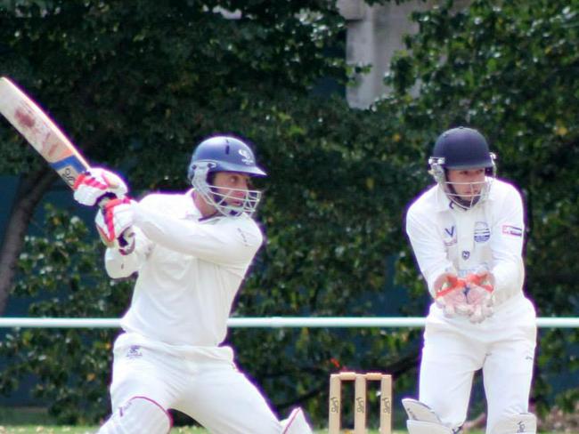 Les Petsinis batting for the Blues.