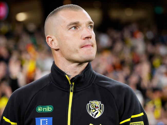 MELBOURNE, AUSTRALIA - AUGUST 24: Retiree Dustin Martin of the Tigers looks on whilst participating in a lap of honour during the 2024 AFL Round 24 match between the Richmond Tigers and the Gold Coast SUNS at The Melbourne Cricket Ground on August 24, 2024 in Melbourne, Australia. (Photo by Dylan Burns/AFL Photos via Getty Images)