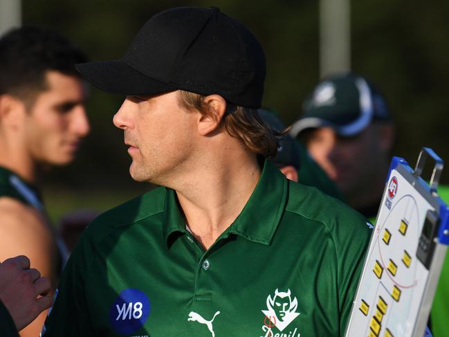 Wantirna South coach Jess Sinclair speaks to his players at the 3/4 time  during the EFL Division two match at Walker Reserve, Wantirna South, Melbourne, Saturday, May 26, 2018. Wantirna Sth v Doncaster East. (AAP Image/James Ross) NO ARCHIVING