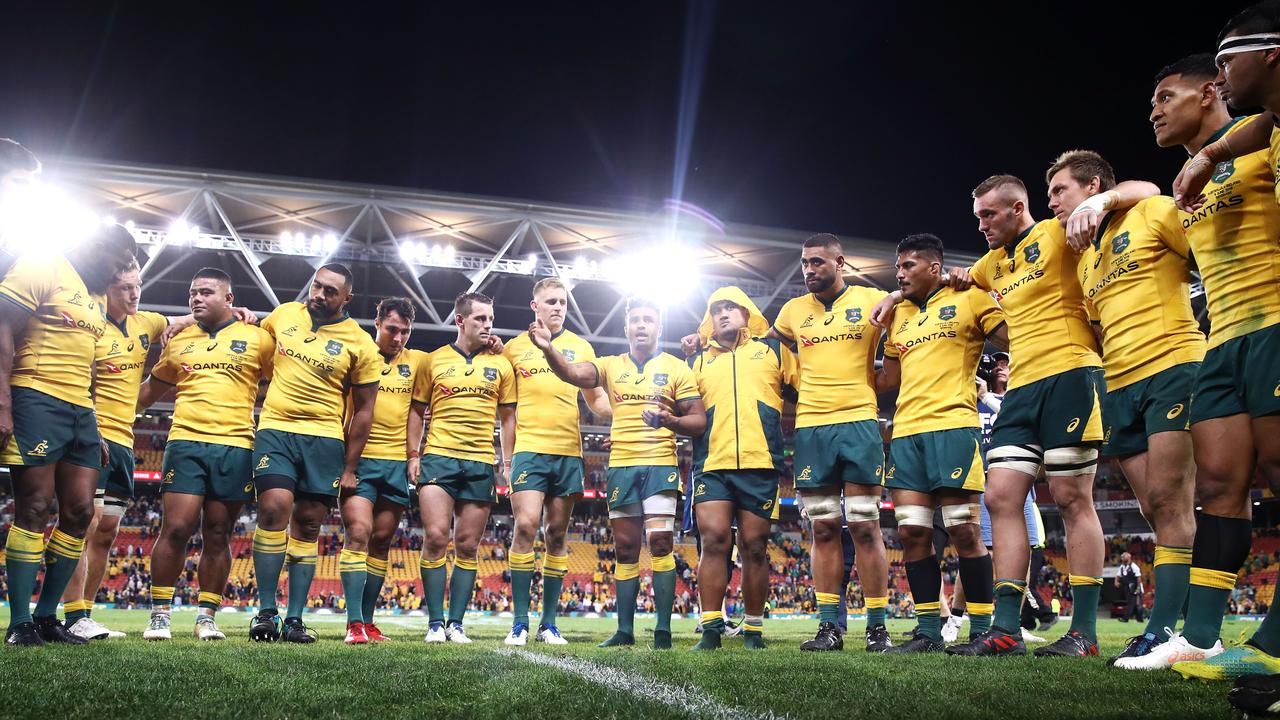 Will Genia of the Wallabies speaks to his team after victory against Ireland.