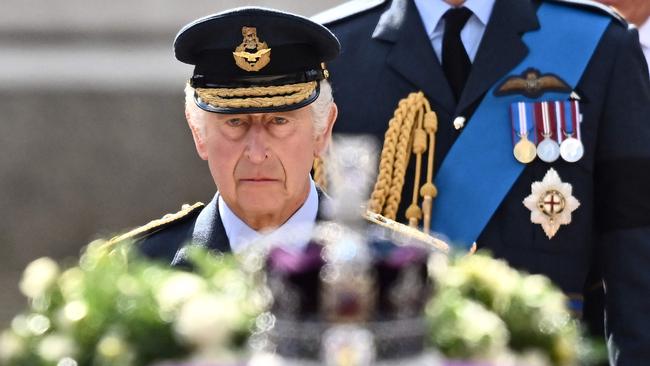 King Charles walks behind the Queen’s coffin during a procession from Buckingham Palace to the Palace of Westminster in London on Wednesday. Picture: AFP