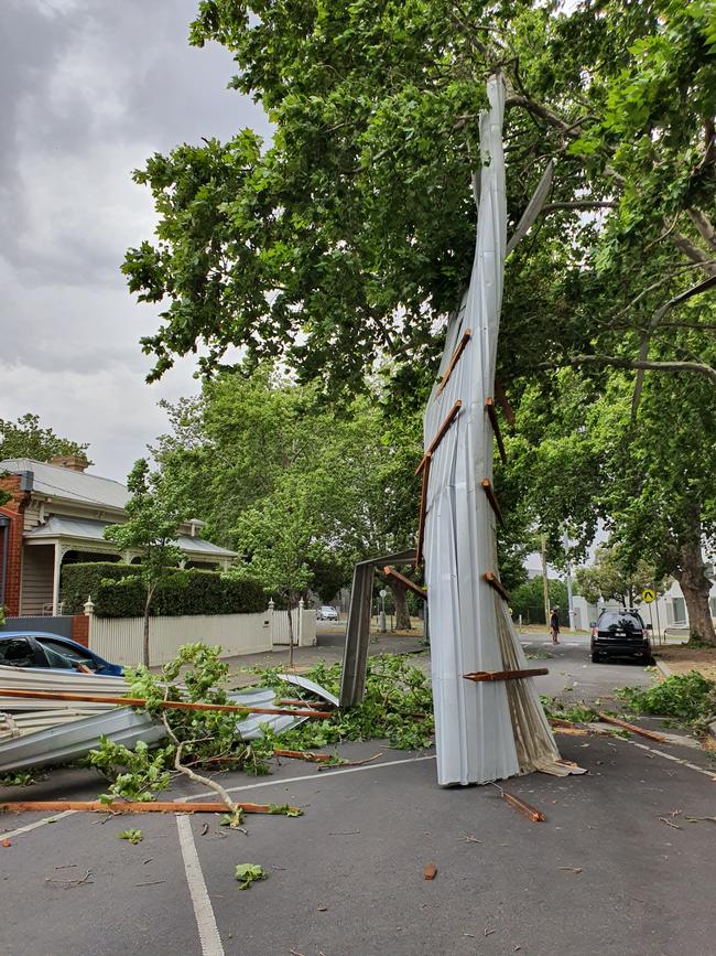 A tin roof has flown off a nearby shop in North Melbourne.