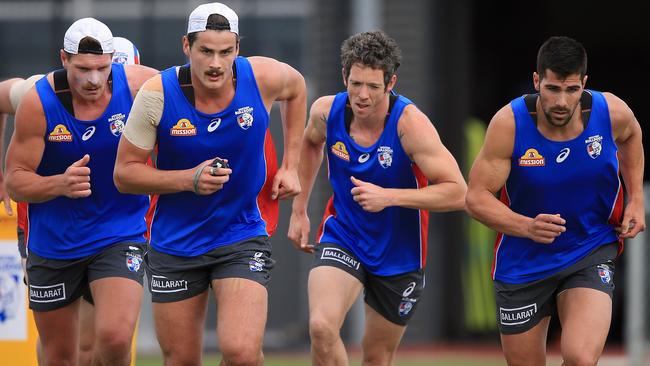 Boyd with Western Bulldogs teammates Jack Redpath, Bob Murphy and Marcus Adams. Picture: Wayne Ludbey