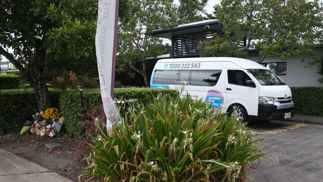 Tributes near the Goodstart Early Learning Centre minibus. Picture: Brendan Radke
