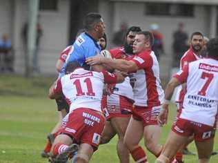 CAPTAINS CONTRBUTION: Welch (middle frame ) is always up for a tackle in the middle of the park. Picture: Mitchell Keenan