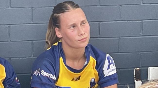 Bond flanker Grace Baker listens to the halftime address.