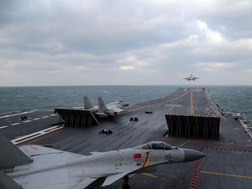 Chinese J-15 fighter jets launching from the deck of the Liaoning aircraft carrier. Picture: AFP