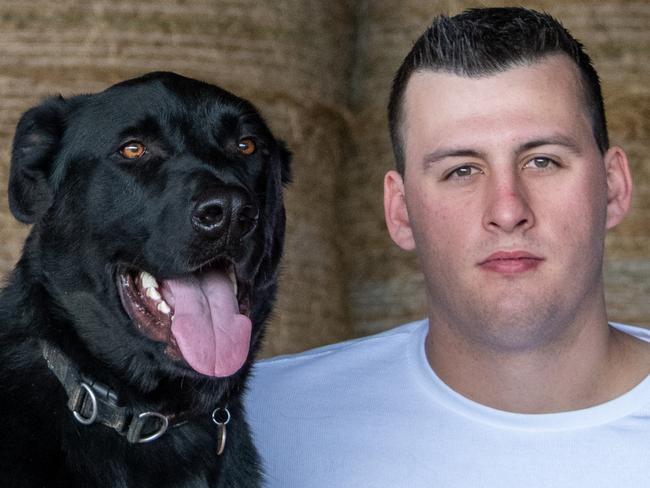 Petbarn is celebrating 50,000 successful in-store pet adoptions.Jasper Bartlett, 21, adopted a German Shepherd cross Great Dane, named Scout (Black), from Petbarn Dubbo in April 2019.Jasper is allergic to dogs but, after getting needles for 3 years, every 4 weeks, to make himself not allergic (as he loves dogs so much), he adopted Scout. He says the adoption process is extremely rewarding, and his love for Scout is unconditional.Jasper also adopted another dog, via RSPCA NSW in February 2020, called Sutton (White) Picture: Sarah  O'Neill/ Petbarn