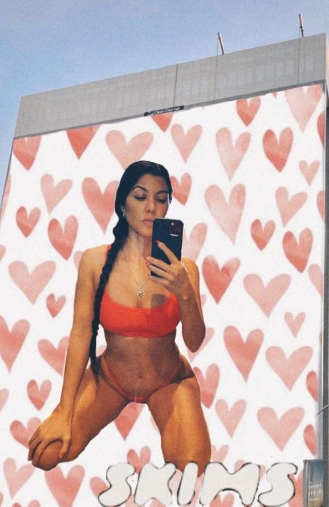 She also shared a SKIMS billboard with her red lingerie selfie edited onto it. Picture: Instagram/KourtneyKardashian