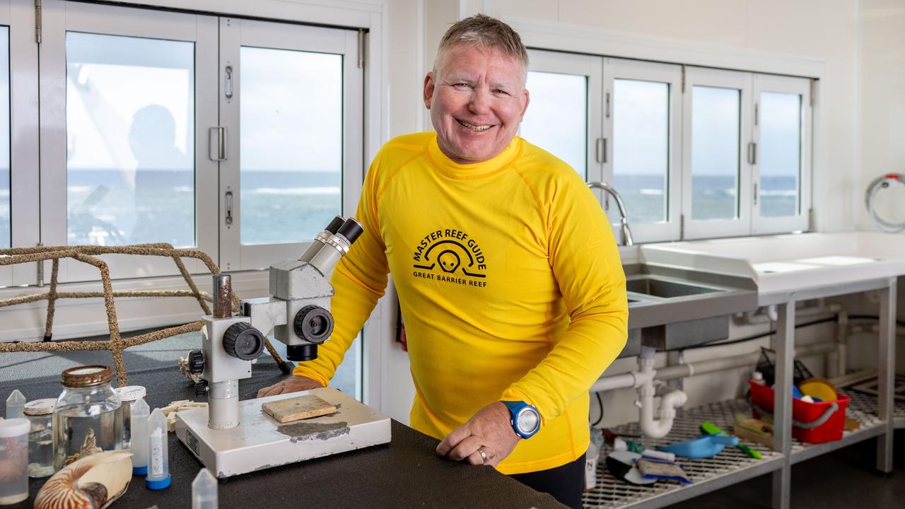 GBR Biology Manager Eric Fisher in the laboratory on the Reef Magic Pontoon at Moore Reef on the Great Barrier Reef. Image Luke Marsden