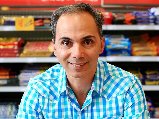 Saeed Fassaie, 51, is an Iranian immigrant who taught himself to read english while reading The Daily Telegraph on his shift at 7-11 petrols station in Forestville. Saeed lives in Forestville with his wife and daughter and has written a book hoping his memoir Rising From The Shadows would help others understand why people come to Australia for a better life. Picture: Adam Taylor