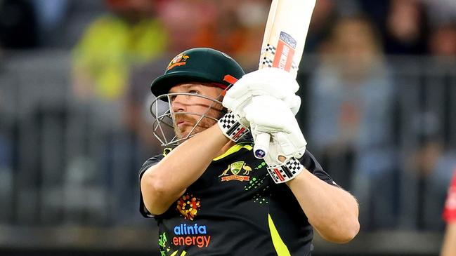 Aaron Finch plays a shot down the ground for four in Perth. Picture: James Worsfold/Getty Images