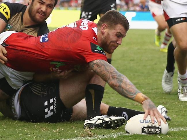 SYDNEY, AUSTRALIA - MARCH 27: Josh Dugan of the Dragons scores try during the round four NRL match between the St George Illawarra Dragons and the Penrith Panthers at WIN Stadium on March 27, 2016 in Sydney, Australia. (Photo by Mark Kolbe/Getty Images)