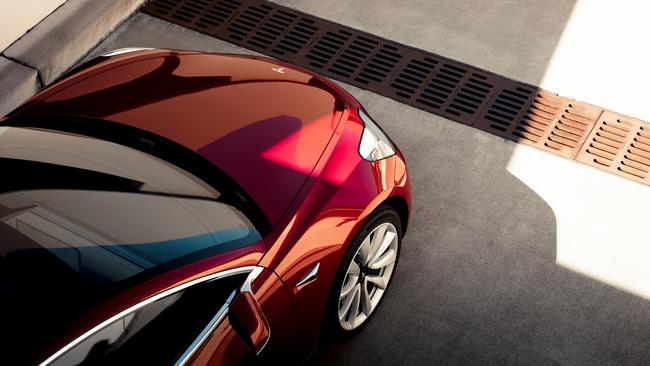 Tesla Model 3 — Model 3 Red Overhead Picture: Tesla