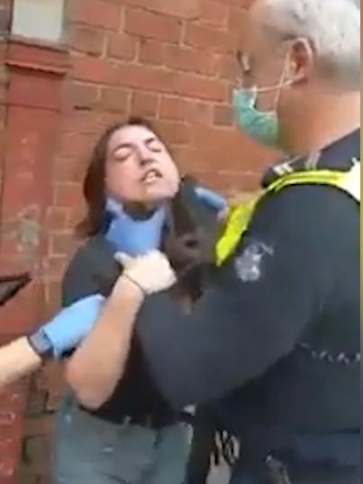 The woman has a medical exemption for not wearing a mask and was arrested for refusing to provide her name and address to police.